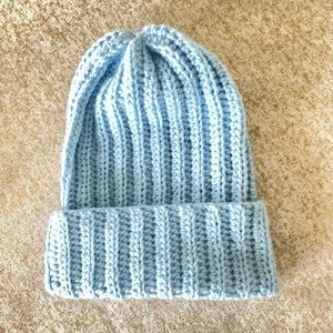 It’s a light blue, cozy beanie. So perfect for this season.